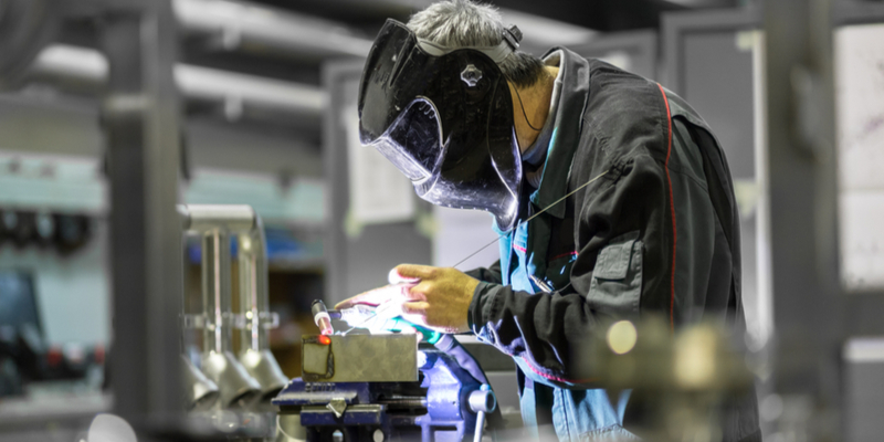 Welder in a manufacturing workshop
