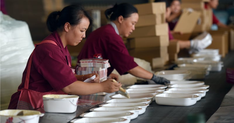 Women working on ceramic
