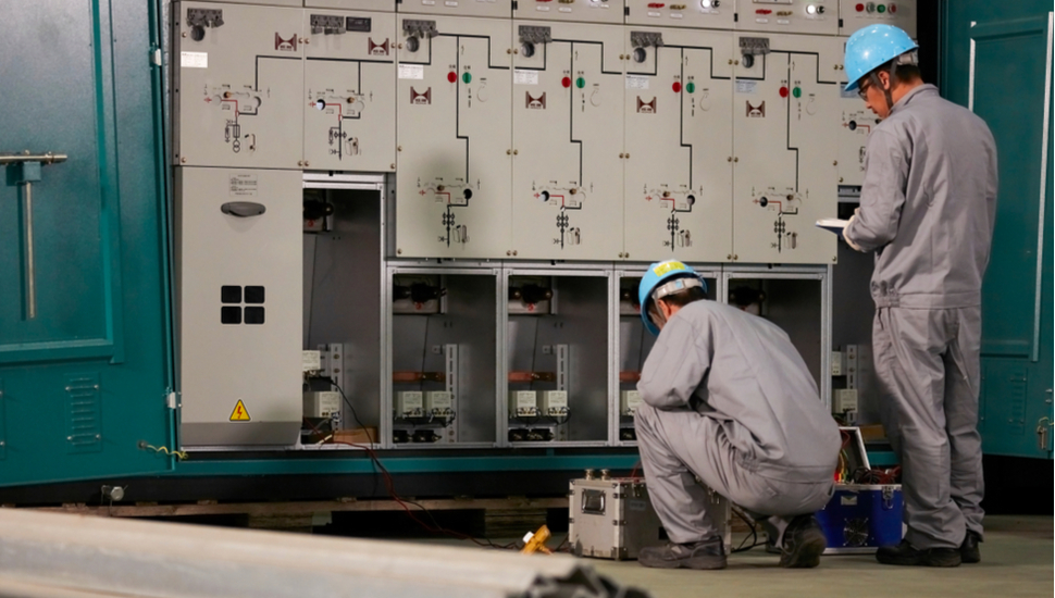 factory engineers checking on equipment