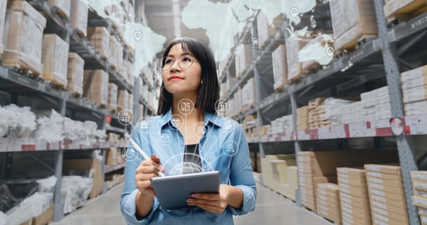 woman using tablet in factory