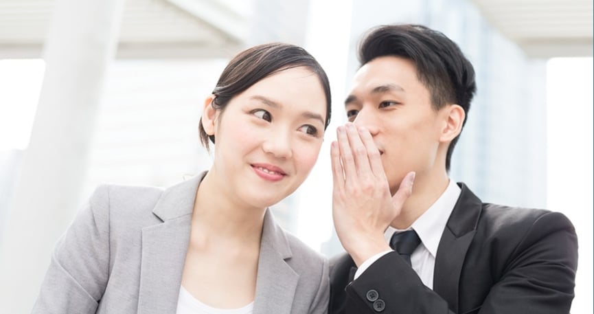 Business people whispering 