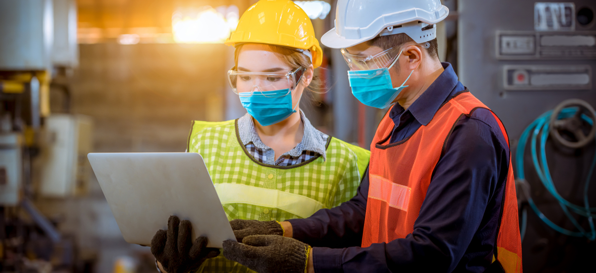factory inspectors with surgical masks