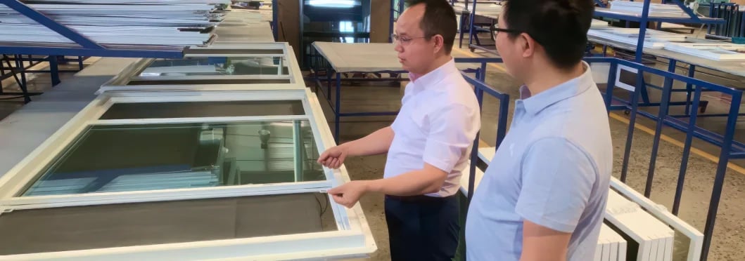 members of MTG inside factory