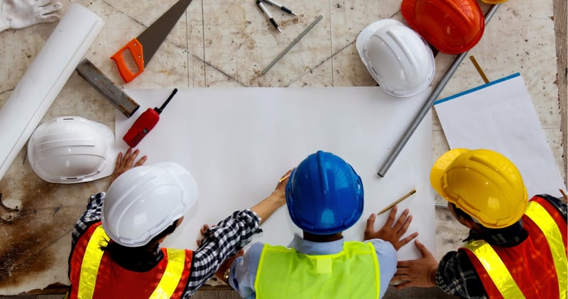Construction workers planning 