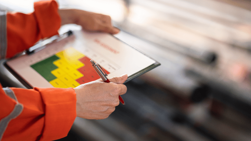 worker holding ipad